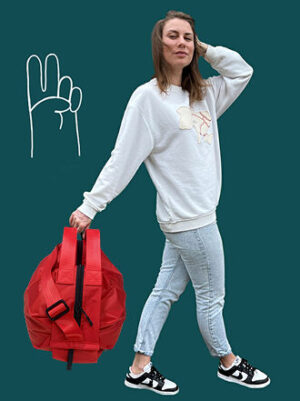 червона сумка равлик кросбаді з кишенею і карабіном